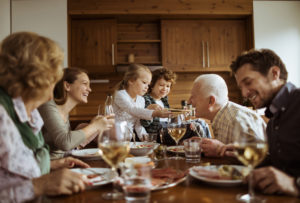 multi-generational family at Thanksgiving dinner table